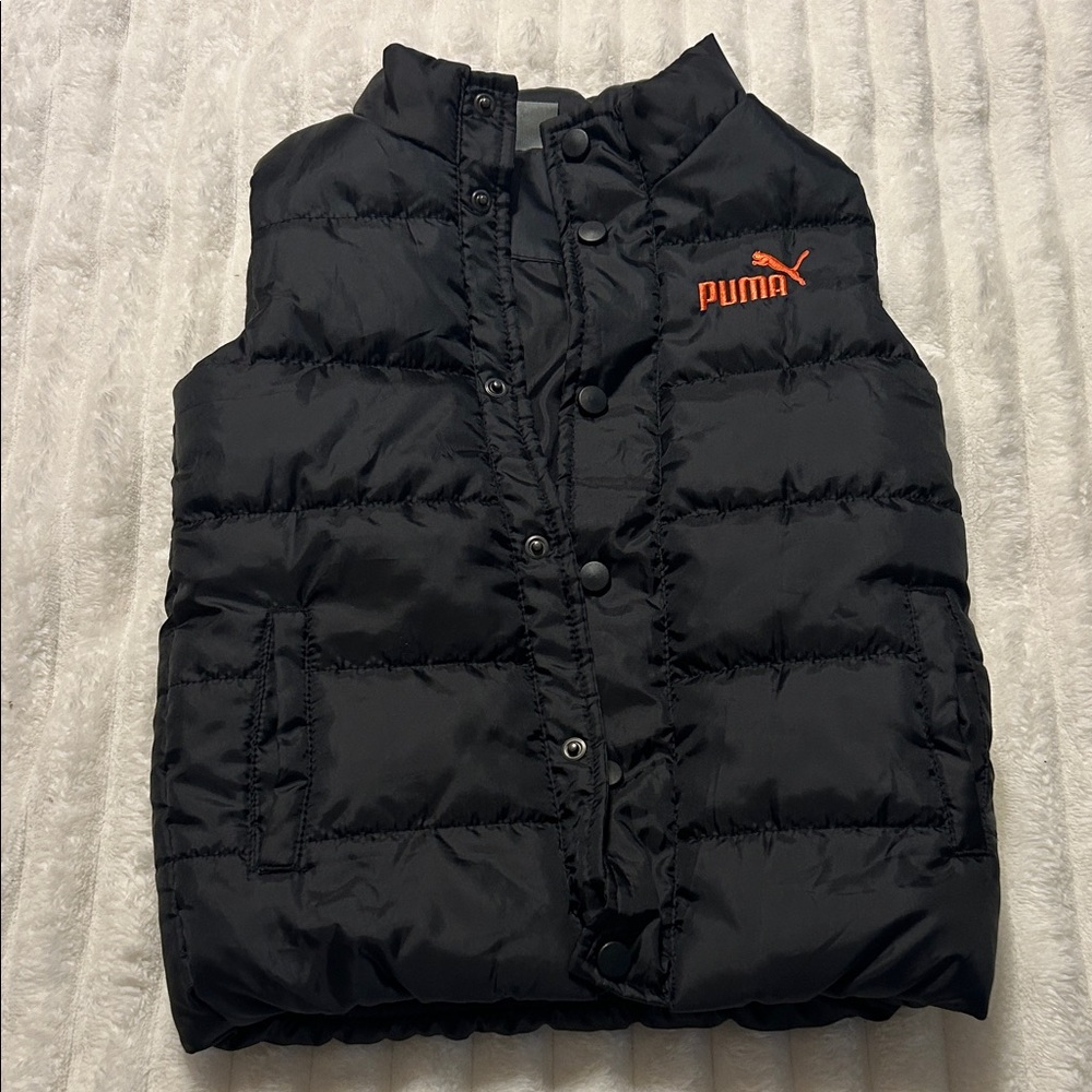 Puma Kids Black Vest with Vibrant Orange Logo